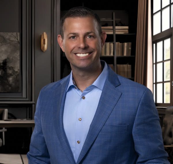 Justin E. Proper